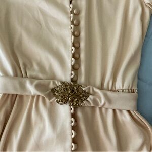 Small vintage dress with special elegant belt.